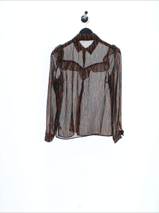 38a6ad587f8cf34794901bafbda12d70