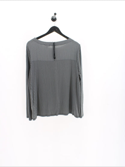 6d5d811dd5c655f50d1d7e4f15f94972