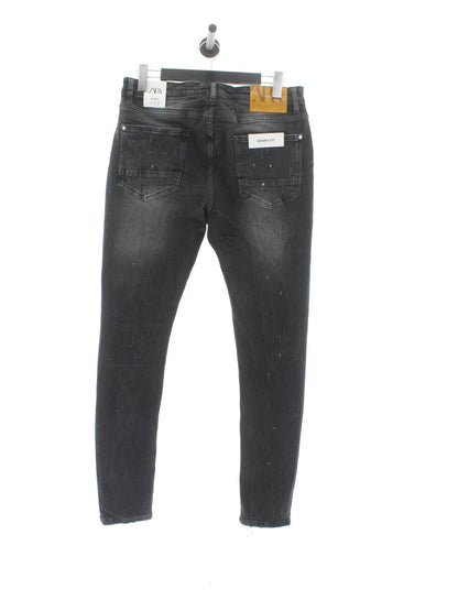 Spodnie jeans Zara Rozmiar: 44