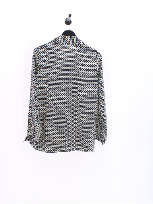 2e7a7c9f49086134bd6a66c974bc51b2