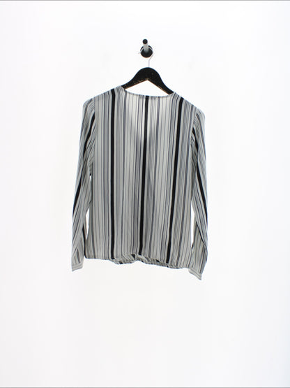 6dc816536fda48aa295b0cb7b54aea77